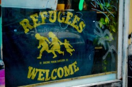 Refugees welcome here in window