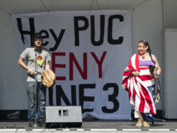 Indigenous activists speak at an event protesting the Line 3 pipeline