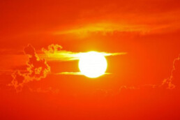 the sun in an orange sky