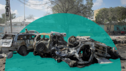 Damaged cars appear against a green circle with a Kabul city street in the background