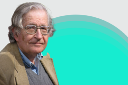 Noam Chomsky against a green and white background