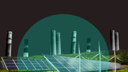 Solar panels and windmills give way to smokestacks in the background