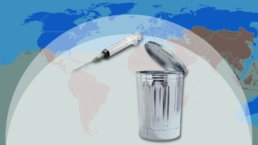 A syringe is flung in a trashcan against a map of the global south