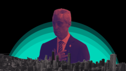Rahm emanuel looking out on chicago skyline