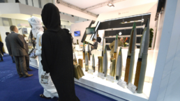Customers survey wares at an arms sale in Abu Dhabi