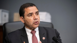 Henry Cuellar sits at his desk during a Congressional hearing