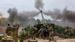 Ukrainian servicemen fire a 2A65 Msta-B howitzer during military exercises near the village of Divychky in Kiev region