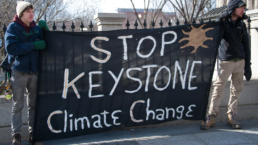 stop keystone banner held by protestors