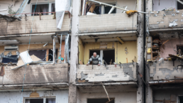 apartment building in Ukraine damaged by Russian assault