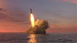 Ballistic missile launch from underwater at sunset