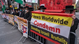 Hasidic Jewish from Anti-Zionists sect of Neturei Karta stage a counter-protest in Times Square