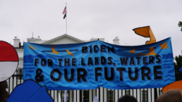 Indigenous protesters at the White House hold signs and banners calling upon Biden to declare a Climate Crisis emergency