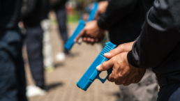 police training with blue guns