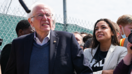Alexandria Ocasio-Cortez and Bernie Sanders at a rally
