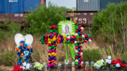 Texans brought prayer candles, bottles of water, and religious icons to a makeshift memorial at the site where 46 migrants were declared dead Monday
