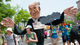 Protesters at the People’s Climate March highlight the need to take action on climate change in Washington DC on April 29, 2017, President Trump’s 100th day in office.
