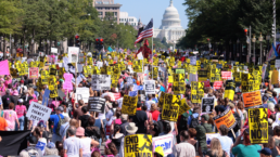 Large anti-war protests engulf the Capitol during the Iraq War