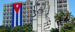Cuban flag and sculpture of Che Guevara on facade of Ministry of Interior, Plaza de la Revolucion, Havana, Cuba on January 28, 2009, on the 50th anniversay of the revolution.