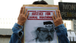 Humanitarian activists hold a poster with a picture of Jamal Khashoggi demonstrating in Makassar. Jamal Khashoggi, a journalist who was killed in Turkey