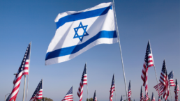 israel flag surrounded by USA flags