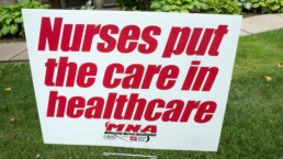 sign reading nurses put the care in healthcare from the Minnesota nurses association