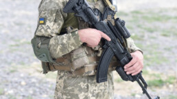 Ukraine soldier holds a rifle