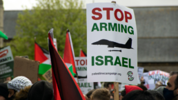stop arming Israel sign at protest in UK
