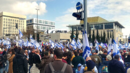 Mass demonstration of protest and opposition strike against government reforms, a mass of people with flags and banners on the streets of the government quarter of Jerusalem