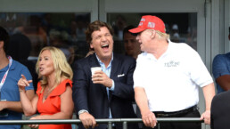 Tucker Carlson (C) jokes with Former President Trump (R) at the 16th Hole during the final LIV Golf Tournament held at the Trump National Golf Club in Bedminster,NJ.