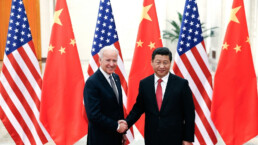 Chinese President Xi Jinping (R) shake hands with U.S Vice President Joe Biden (L) inside the Great Hall of the People