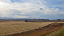 Scenic view of a petroleum oil well on a farm field in montana, usa