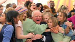 Minnesota governor embraced by children after signing legislation