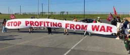 stop profiteering from war banner