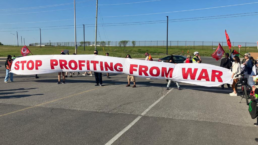 stop profiteering from war banner