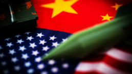 usa china tensions bullets and ammunition on flags