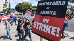 writers guild of america on strike protest sign