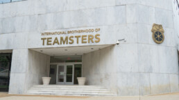 ntrance to the headquarters of the International Brotherhood of Teamsters, short set of steps up to a glass door