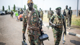 Sudanese soldier with a machine gun