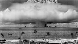 The BAKER test of Operation Crossroads, July 25, 1946. Seconds after the water column rose, and formed a condensation cloud, it fell back, unleashing a billowing base surge forming a 500 foot high wal
