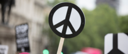 peace sign at rally