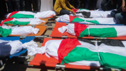 Several Palestinian bodies were covered with Palestinian flags due to Israeli bombs