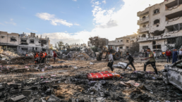 The Palestinian Civil Defense searches for survivors in a house for the Mukhaimir family and neighboring houses after an Israeli raid in the city of Rafah, south of the Gaza Strip on October 17 2023