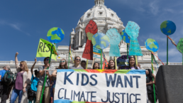 children protesting who want climate justice