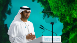 Sultan Al Jaber speaks at a podium