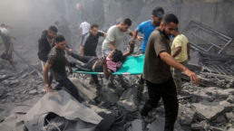 Palestinians look for survivors after an Israeli airstrike in Rafah refugee camp, southern Gaza Strip, on October 12 2023