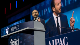 AIPAC convention with a speaker at the podium