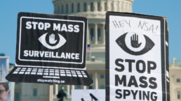 stop mass surveillance protest signs