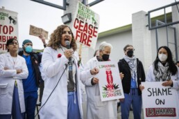 Maisa Morrar speaks at a rally of health care workers in front of the L3 Harris office in San Leandro on Jan. 24, 2024.