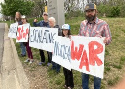 About 50 people protested April 15 outside the Kansas City National Security Campus, a plant run by Honeywell, calling for an end to nuclear weapons and criticizing a proposed expansion of the facility. Thomas C. Fox, NCR's editor/publisher emeritus, was among 10 people arrested during the protest. (Courtesy of Thomas C. Fox)