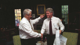 bill clinton and boris yeltsin shake hands in an office